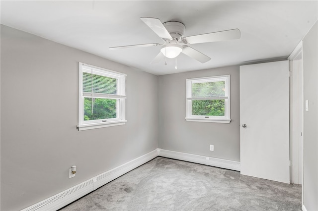 247 Pringle St, Banksville/Westwood, PA 15106 - carpeted empty room featuring baseboards, a baseboard heating unit, and a ceiling fan