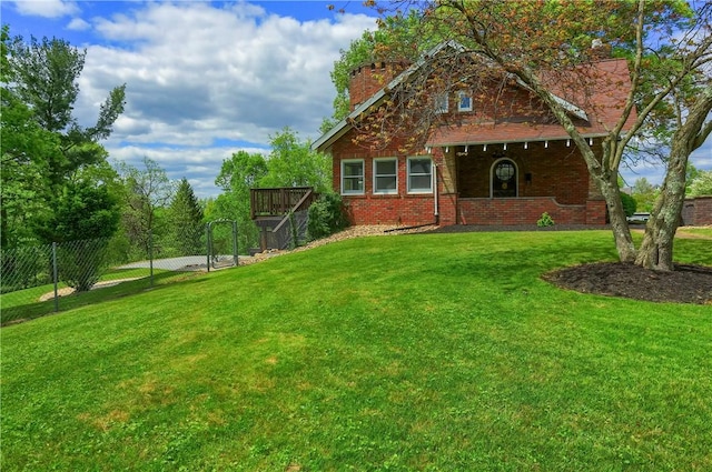 view of front of home featuring brick siding and a chimney