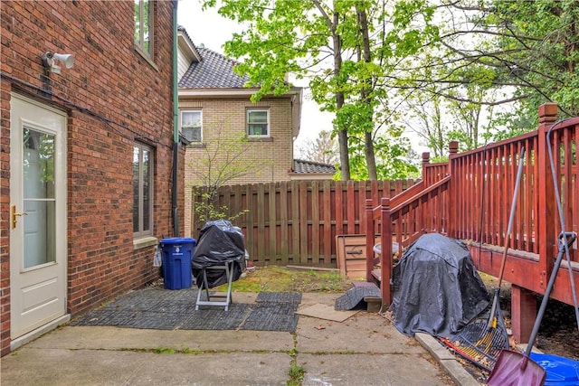 view of patio / terrace featuring fence