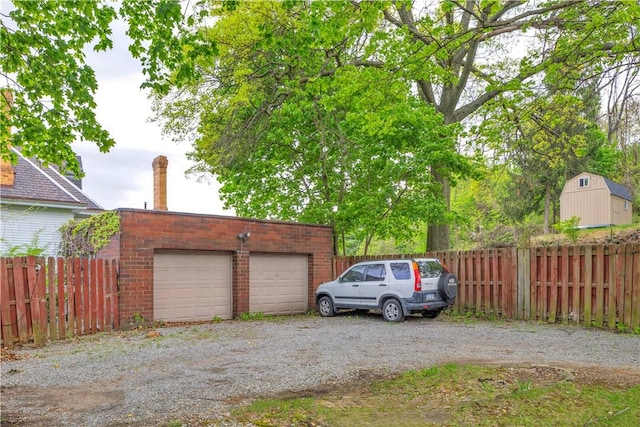 garage featuring fence