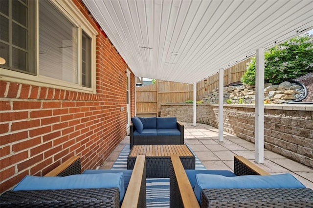 665 Dunster St, Brookline, PA 15226 - view of patio / terrace featuring an outdoor hangout area and fence