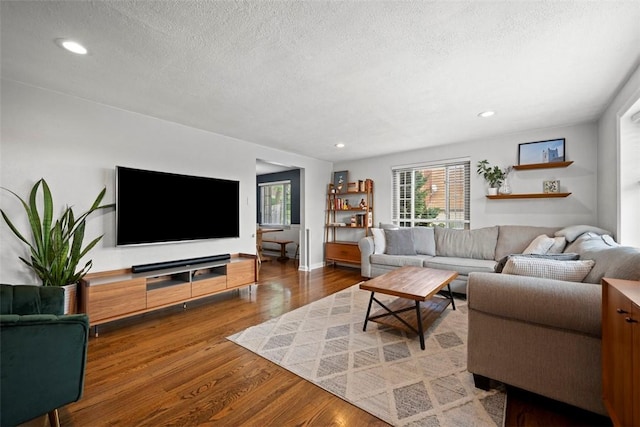 665 Dunster St, Brookline, PA 15226 - living room with a textured ceiling, wood finished floors, recessed lighting, and baseboards