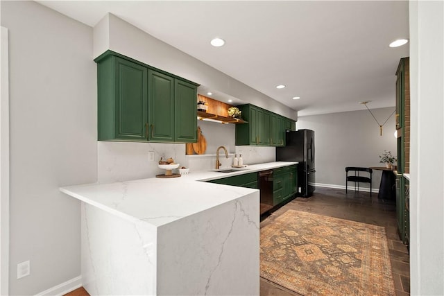 205 Seegar Rd, Upper St Clair, PA 15241 - kitchen with green cabinetry, a sink, black appliances, recessed lighting, and baseboards