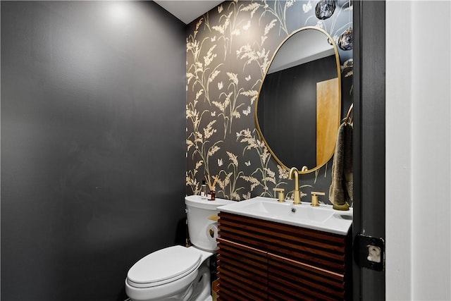 205 Seegar Rd, Upper St Clair, PA 15241 - bathroom with wallpapered walls, toilet, and vanity