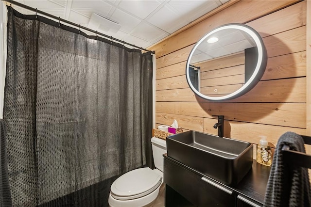 133 Imperial Rd, Hidden Valley, PA 15502 - bathroom featuring wood walls, vanity, and a shower with curtain