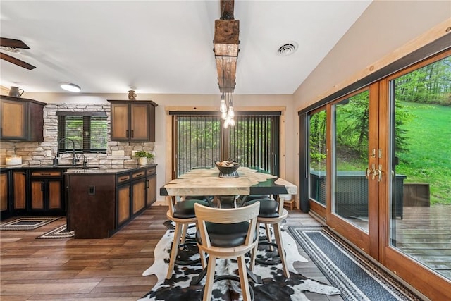 133 Imperial Rd, Hidden Valley, PA 15502 - dining area with dark wood-style flooring, healthy amount of natural light, and lofted ceiling