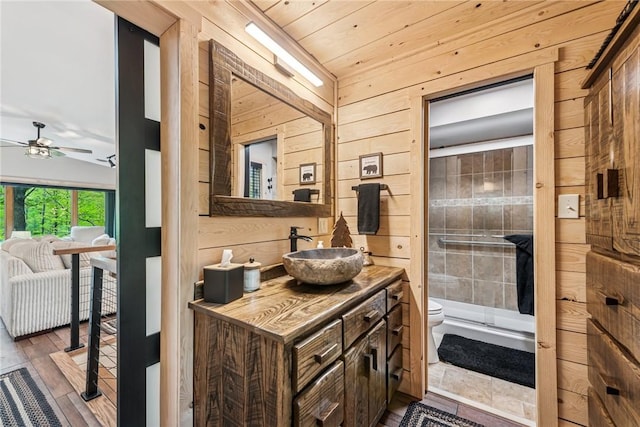 133 Imperial Rd, Hidden Valley, PA 15502 - full bathroom featuring vanity, wood walls, a ceiling fan, a shower stall, and wooden ceiling