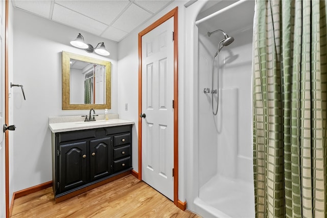 844 Old Millcreek Rd, Hookstown, PA 15050 - bathroom with a stall shower, vanity, wood finished floors, and a paneled ceiling