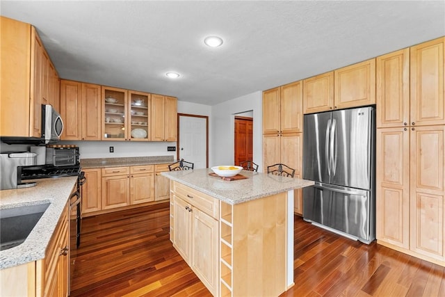 844 Old Millcreek Rd, Hookstown, PA 15050 - kitchen with stainless steel appliances, light brown cabinets, dark wood-type flooring, light stone countertops, and recessed lighting
