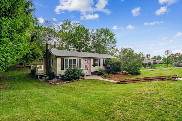 716 Stauffer Ave, Scottdale, PA 15683 - view of front of property featuring a chimney and a front lawn