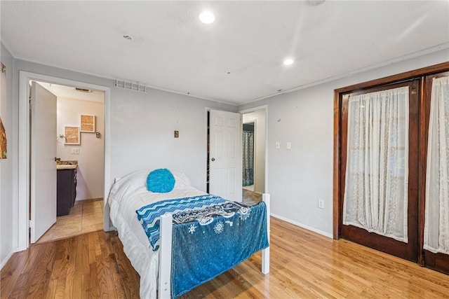 716 Stauffer Ave, Scottdale, PA 15683 - bedroom featuring wood finished floors, baseboards, and recessed lighting
