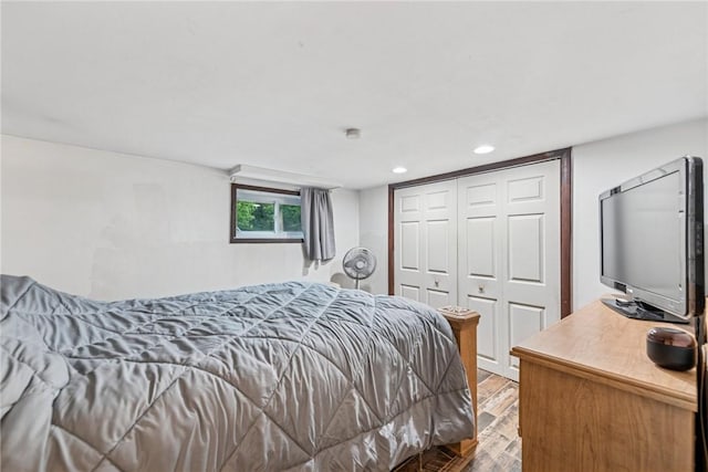 716 Stauffer Ave, Scottdale, PA 15683 - bedroom with wood finished floors, recessed lighting, and a closet