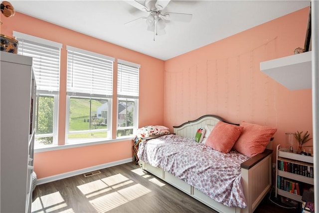 276 Regency Dr, North Strabane, PA 15330 - bedroom with multiple windows, wood finished floors, baseboards, and ceiling fan