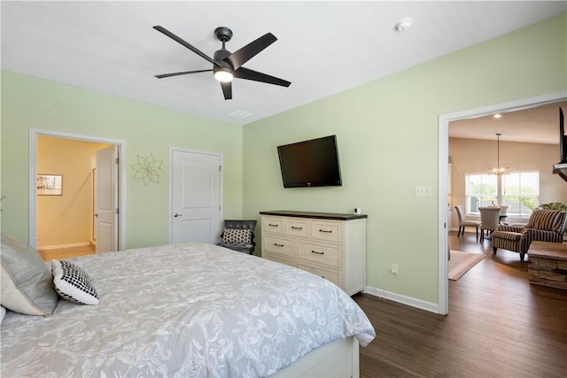 276 Regency Dr, North Strabane, PA 15330 - bedroom featuring dark wood-style floors, baseboards, a chandelier, a ceiling fan, and ensuite bath