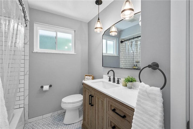 full bath with tile patterned floors, toilet, and vanity