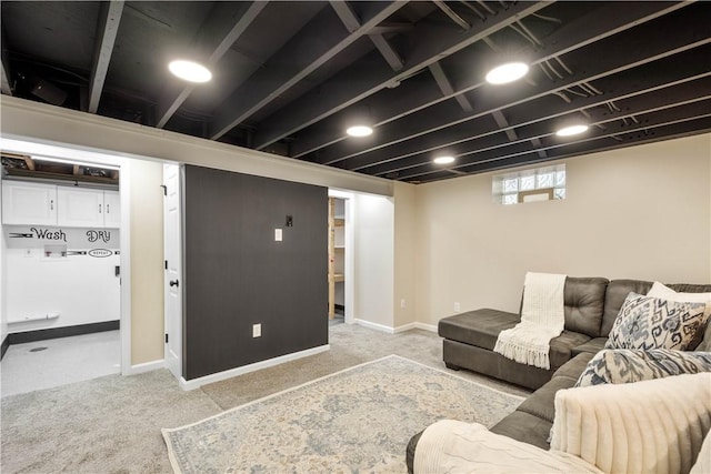 living room with light carpet and baseboards