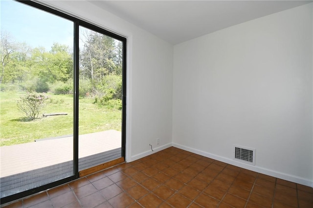 2608 Big Sewickley Creek Rd, Franklin Park, PA 15143 - unfurnished room with dark tile patterned flooring and baseboards