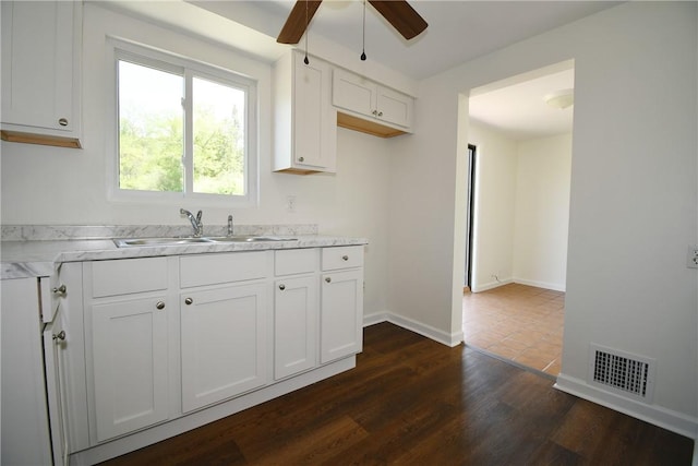 2608 Big Sewickley Creek Rd, Franklin Park, PA 15143 - kitchen featuring a sink, a ceiling fan, white cabinetry, light countertops, and dark wood finished floors