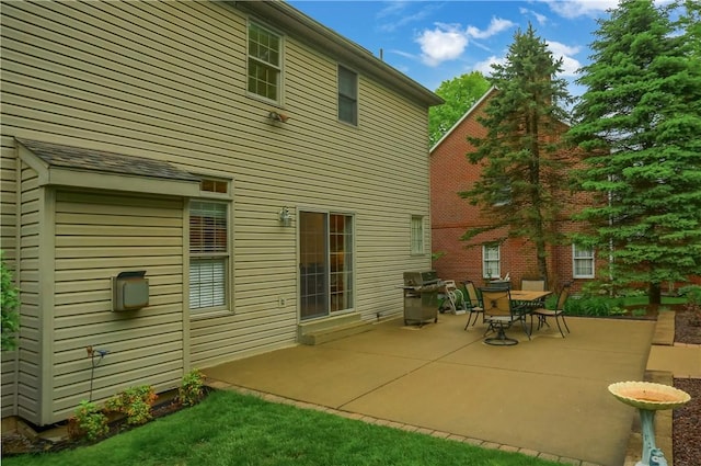rear view of house with a patio