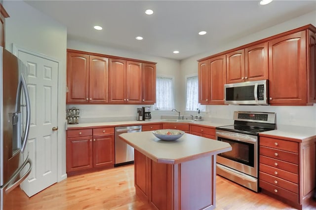 441 Settlers Village Cir, Cranberry Twp, PA 16066 - kitchen featuring appliances with stainless steel finishes, light countertops, light wood-style flooring, recessed lighting, and a kitchen island
