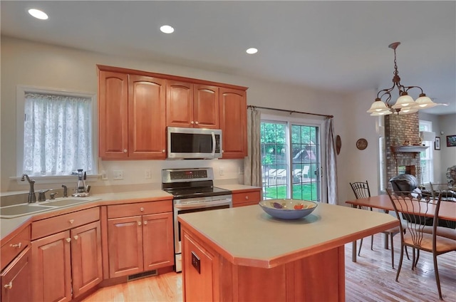 441 Settlers Village Cir, Cranberry Twp, PA 16066 - kitchen with stainless steel appliances, light wood-type flooring, light countertops, recessed lighting, and pendant lighting