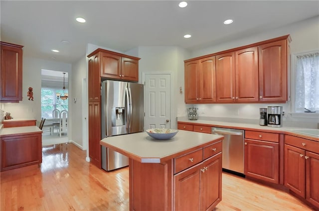 441 Settlers Village Cir, Cranberry Twp, PA 16066 - kitchen featuring stainless steel appliances, light countertops, light wood finished floors, a center island, and recessed lighting