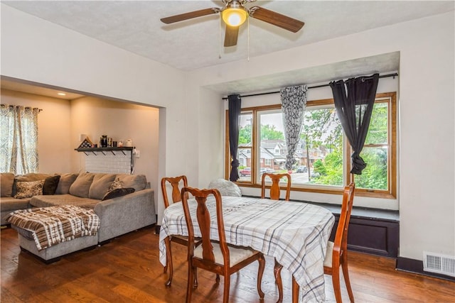 dining room featuring hardwood / wood-style floors and ceiling fan