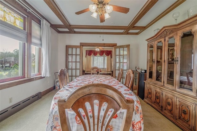 dining area with a baseboard heating unit, a ceiling fan, light carpet, coffered ceiling, and french doors