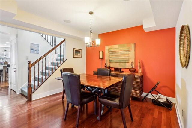238 Berkeley Way, Monroeville, PA 15146 - dining room featuring stairway, baseboards, dark wood-type flooring, and a chandelier