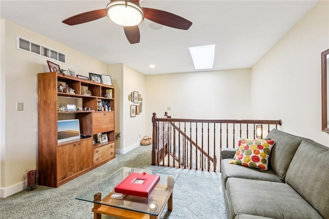 238 Berkeley Way, Monroeville, PA 15146 - living room featuring a skylight, light carpet, baseboards, and ceiling fan
