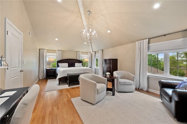 bedroom featuring multiple windows, light wood finished floors, vaulted ceiling, a chandelier, and recessed lighting