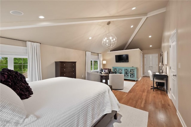 bedroom featuring beam ceiling, multiple windows, light wood-style flooring, a chandelier, and recessed lighting