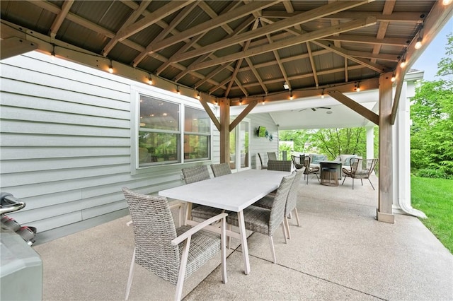 view of patio / terrace featuring a gazebo, an outdoor fire pit, and outdoor dining area