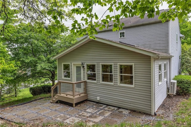 back of house featuring a patio and central AC