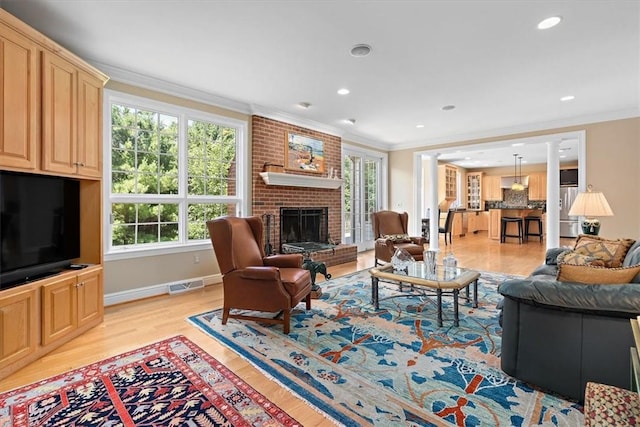 305 Woodstream Dr, Ohara, PA 15238 - living room with crown molding, a fireplace, light wood-style flooring, recessed lighting, and baseboards