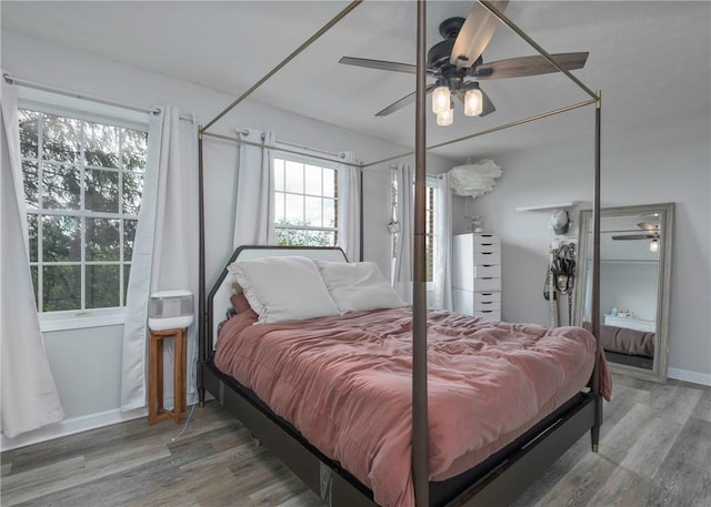 432 Independence Blvd, South Strabane, PA 15301 - bedroom with wood finished floors, baseboards, and a ceiling fan