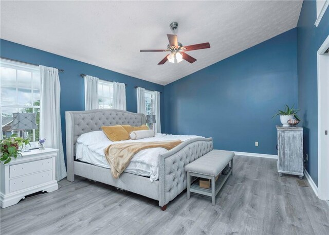 432 Independence Blvd, South Strabane, PA 15301 - bedroom with lofted ceiling, wood finished floors, baseboards, and ceiling fan