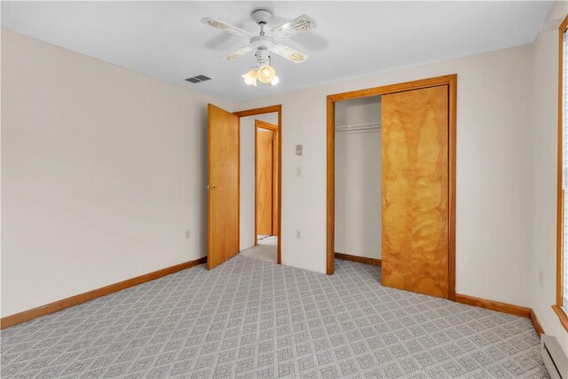 1636 Brodhead Rd, Moon/Crescent Twp, PA 15108 - unfurnished bedroom with baseboard heating, light colored carpet, a closet, and baseboards