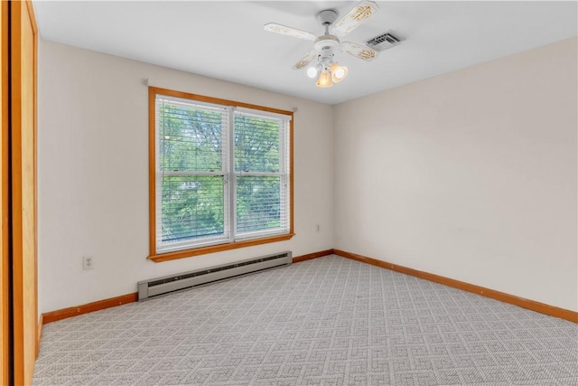 1636 Brodhead Rd, Moon/Crescent Twp, PA 15108 - empty room featuring baseboard heating, a ceiling fan, and baseboards