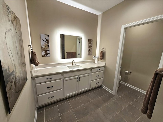 129 Bay Ct, Chartiers, PA 15301 - bathroom with toilet, tile patterned floors, vanity, and baseboards