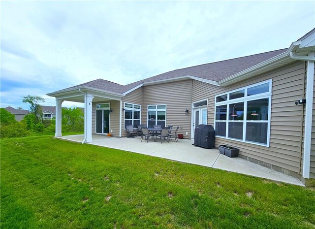 129 Bay Ct, Chartiers, PA 15301 - back of property with a yard and a patio area