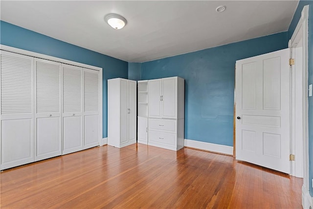 106 Haldane St, Crafton, PA 15205 - unfurnished bedroom with baseboards, wood finished floors, and a closet