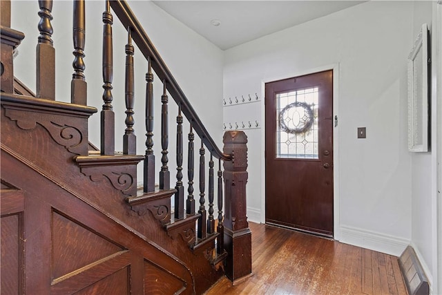 106 Haldane St, Crafton, PA 15205 - entrance foyer featuring baseboards, hardwood / wood-style floors, and stairway
