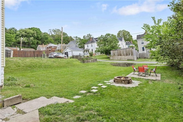 106 Haldane St, Crafton, PA 15205 - view of yard featuring an outdoor fire pit, a residential view, and a patio