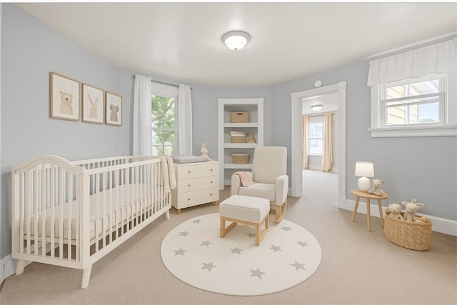 106 Haldane St, Crafton, PA 15205 - carpeted bedroom with a crib and baseboards