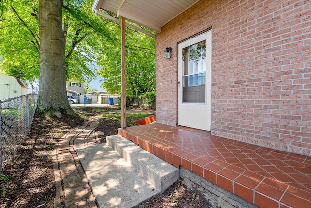 view of patio / terrace featuring fence
