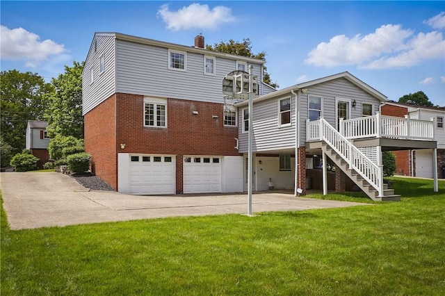 back of house featuring concrete driveway, brick siding, a garage, stairway, and a chimney