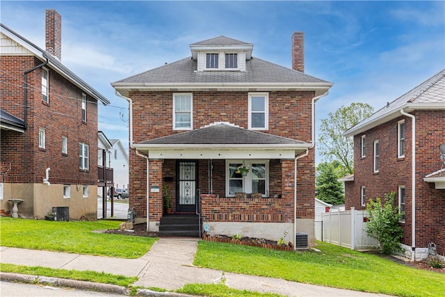 57 Laurel Ave, City Of Washington, PA 15301 - american foursquare style home with a chimney, brick siding, a porch, and roof with shingles