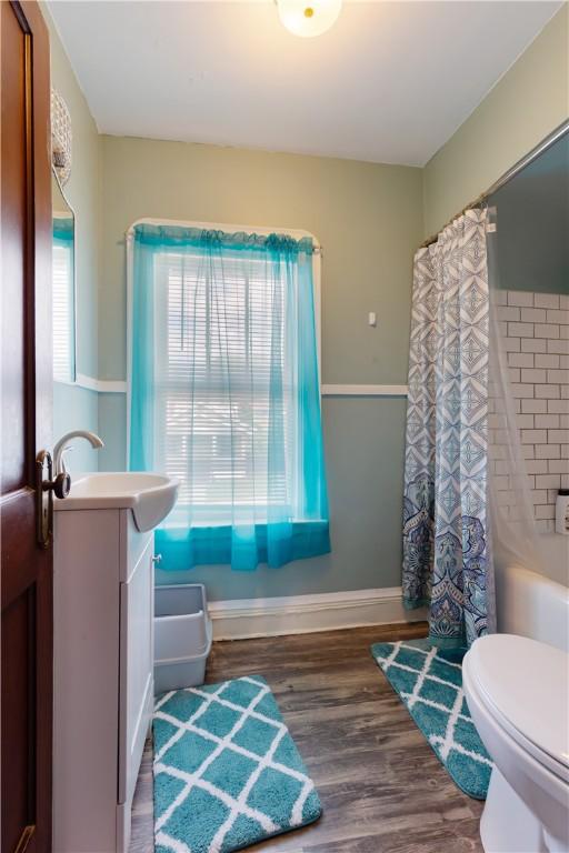 57 Laurel Ave, City Of Washington, PA 15301 - bathroom featuring toilet, baseboards, wood finished floors, and vanity