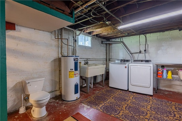 57 Laurel Ave, City Of Washington, PA 15301 - basement featuring water heater, washer and clothes dryer, and a sink